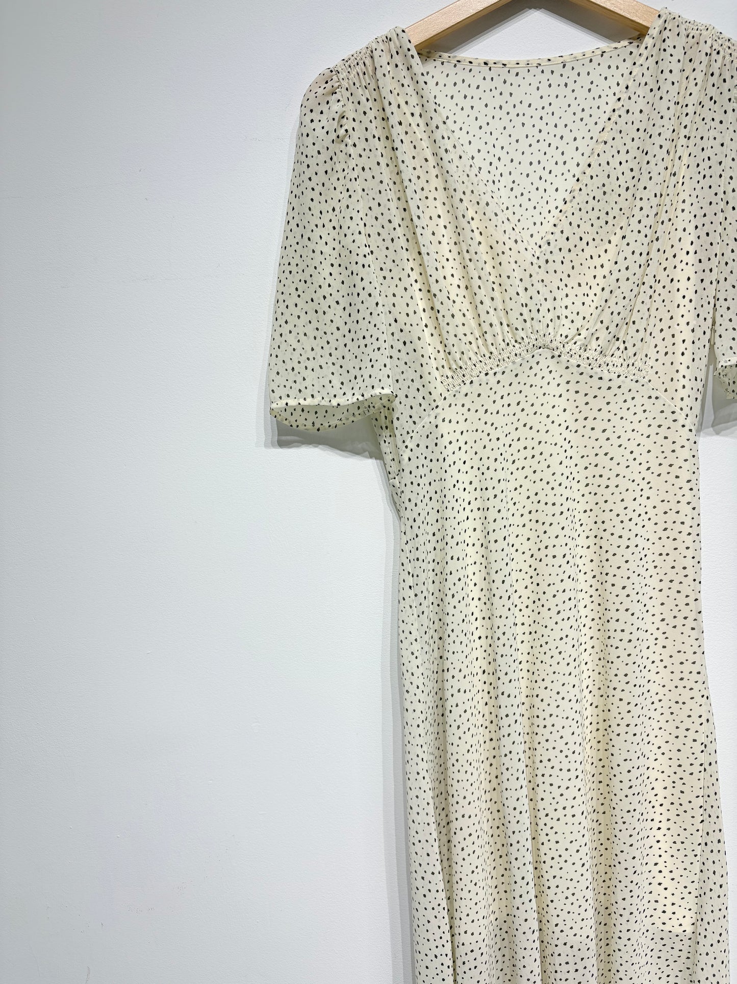 Vestido topitos jaspeados de H&M