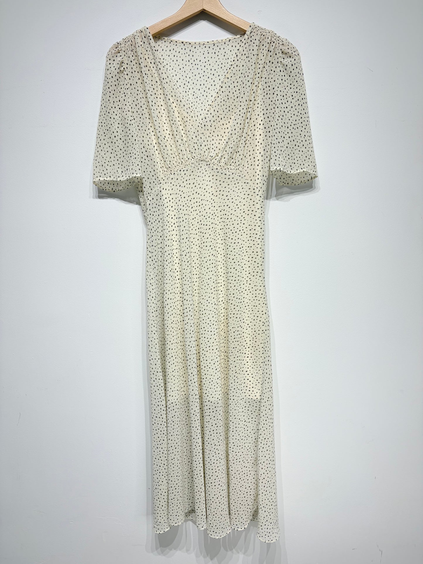 Vestido topitos jaspeados de H&M