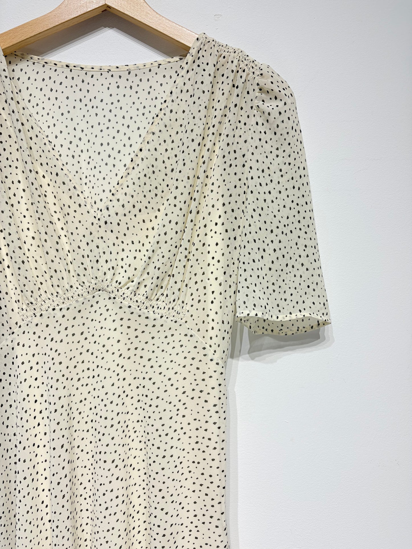 Vestido topitos jaspeados de H&M