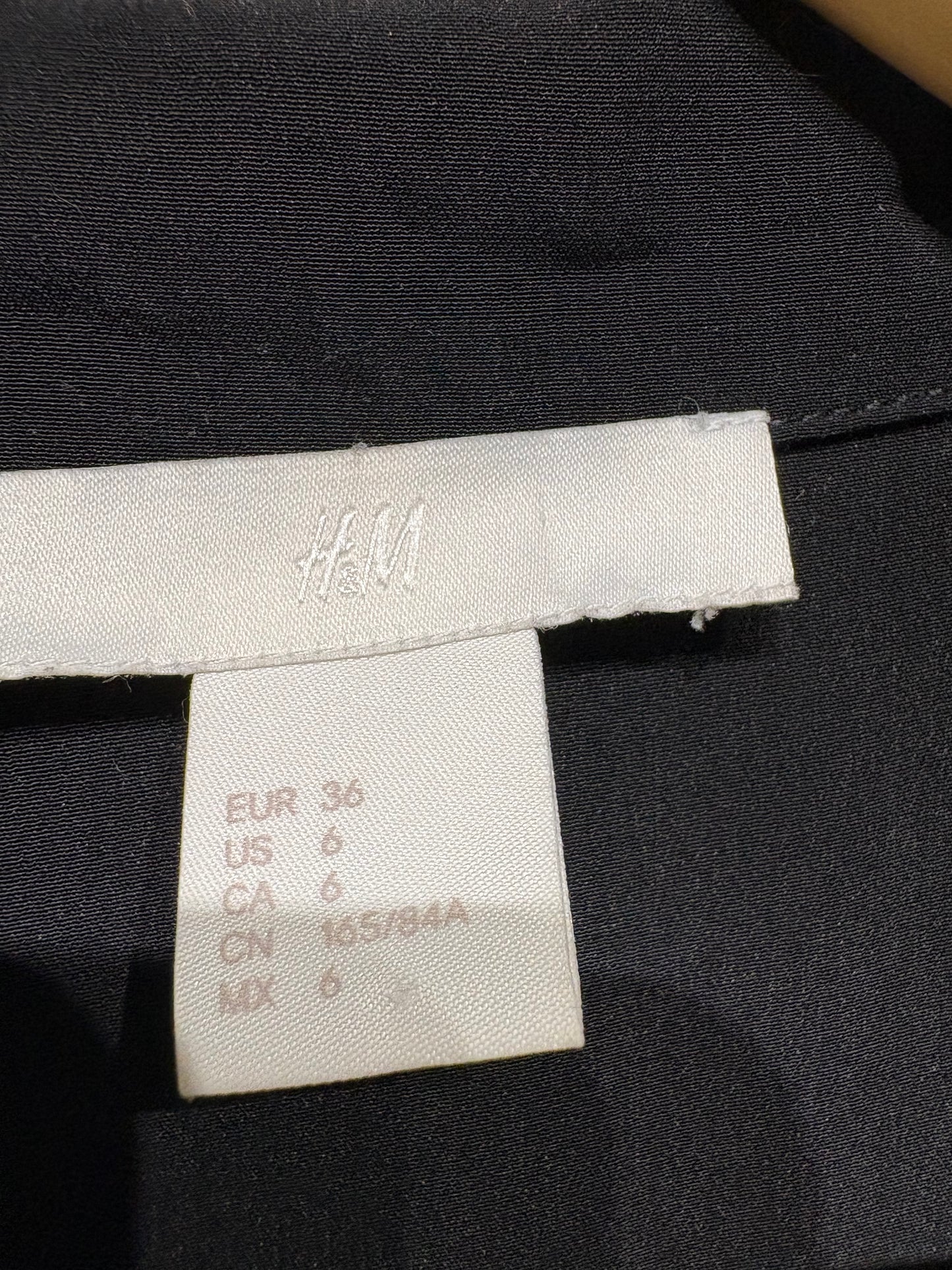 Chaleco largo tipo traje H&M