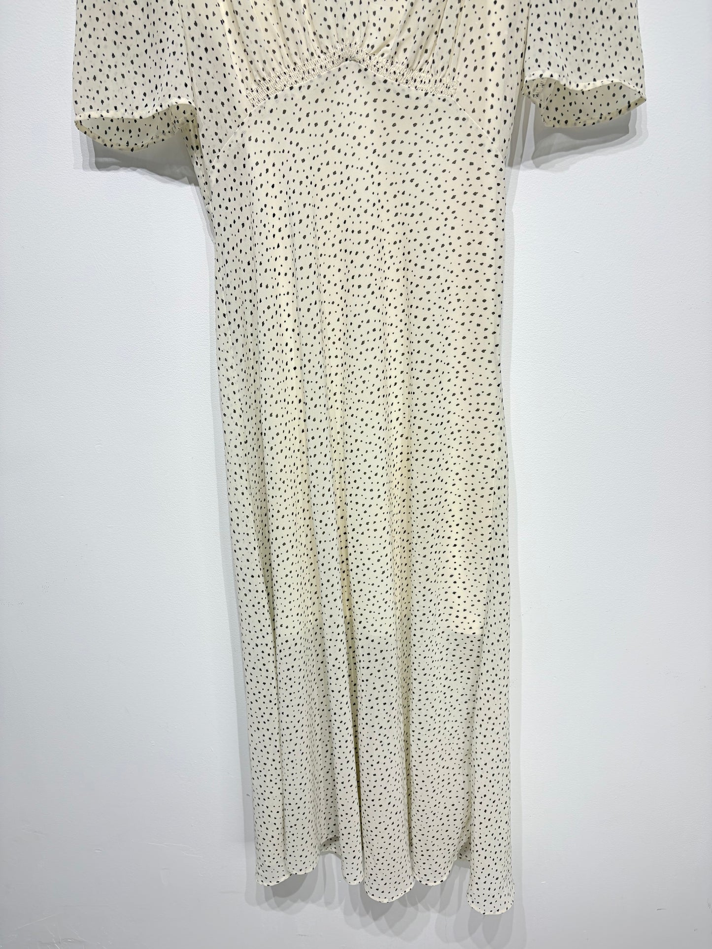 Vestido topitos jaspeados de H&M